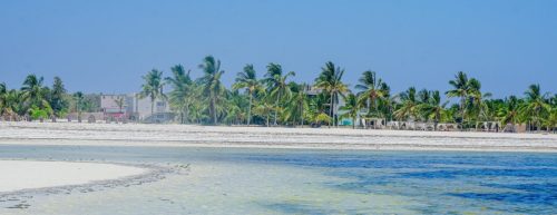 Beautiful clear blue waters and white sand beach on the Kenyan coast