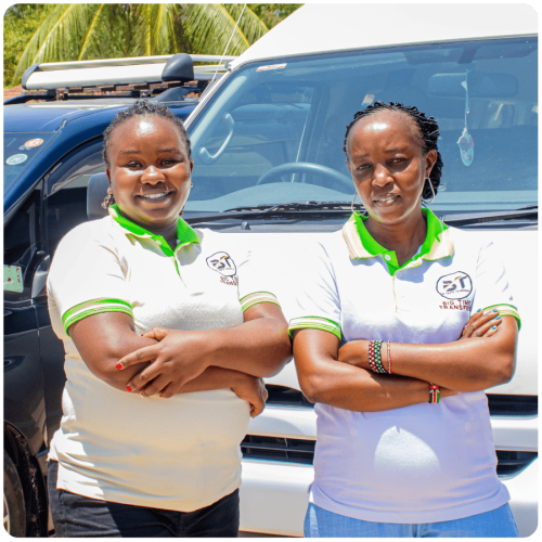 Friendly Bigtime Transfers staff members smiling and ready to assist travelers
